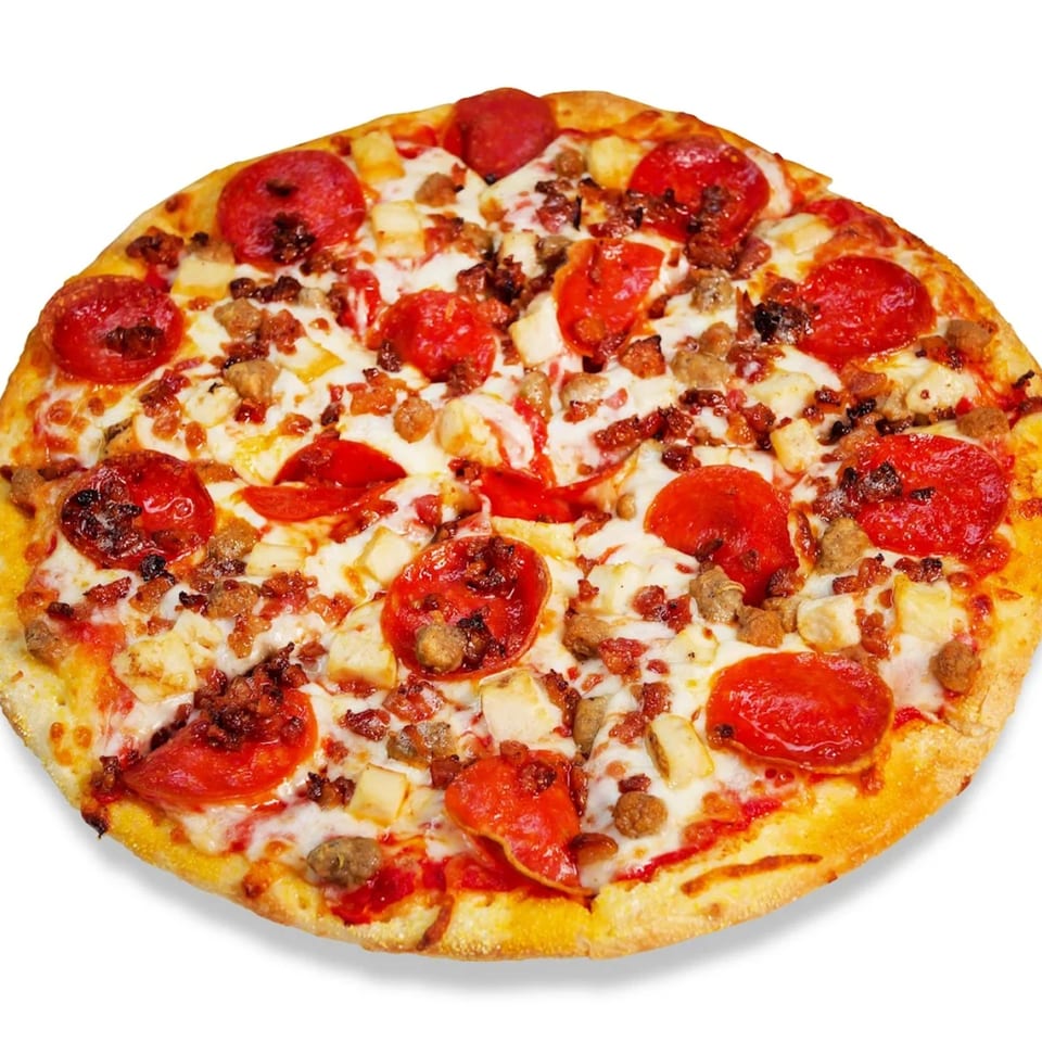 A Pizza Bites pizza with pepperoni, sausage, bacon, and chicken on a white background.